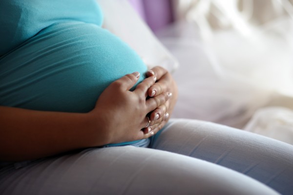 Woman with braces while pregnant