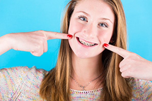 Smiling Girl Wearing Braces